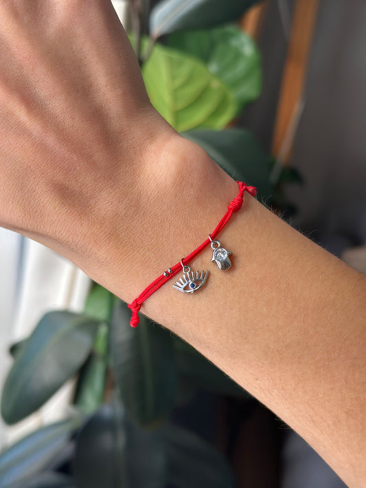 Amuleto ojo + manito zirconia