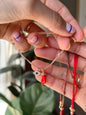 Amuleto figa roja