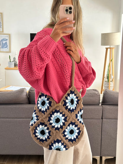 Cartera bolso vibrando alto