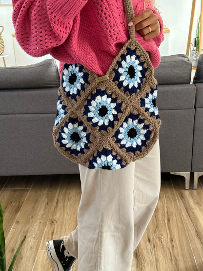 Cartera bolso vibrando alto