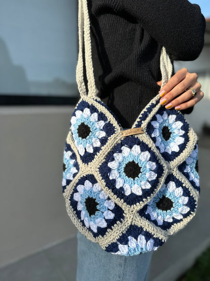 Cartera bolso vibrando alto