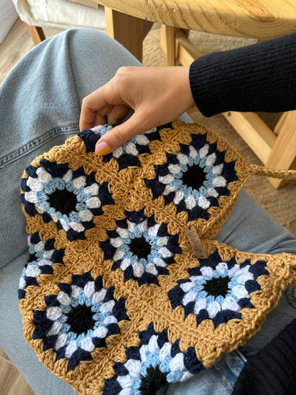 Cartera bolso vibrando alto